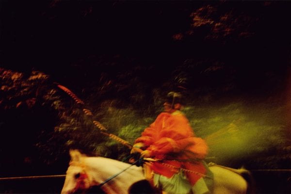 person on a white horse from the sunlanders series, color darkroom prints handmade by Sean Lotman