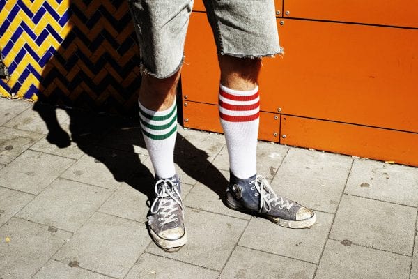 man standing street photography, colorful, by Manuel Armenis