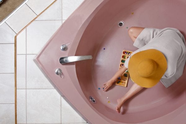 woman in bathtub color photography of patterns from above by Hayley Eichenbaum and Zach Swearingen