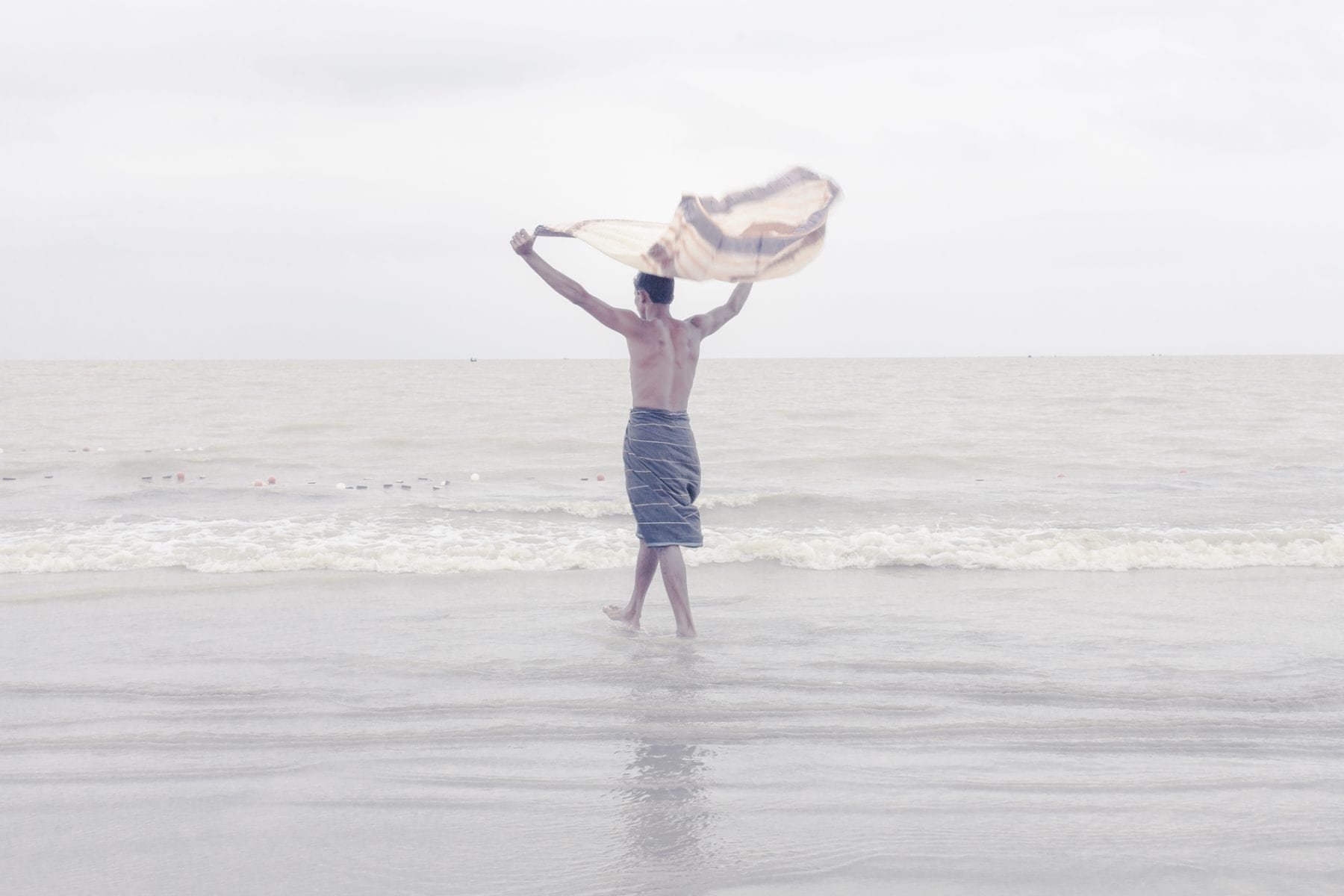 Farhad Rahman travel photography, man on beach, Bangladesh