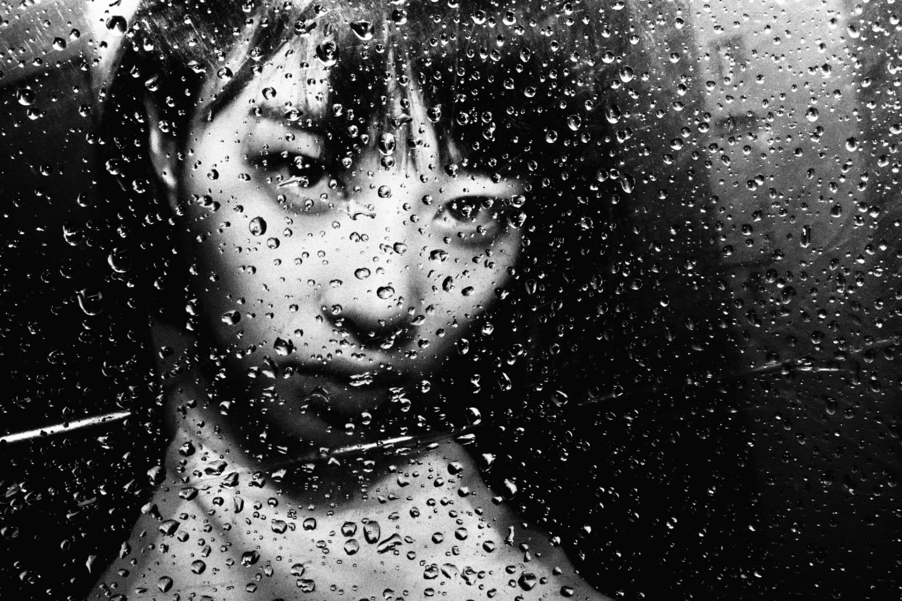 black and white close up portrait of a girl by Tatsuo Suzuki,