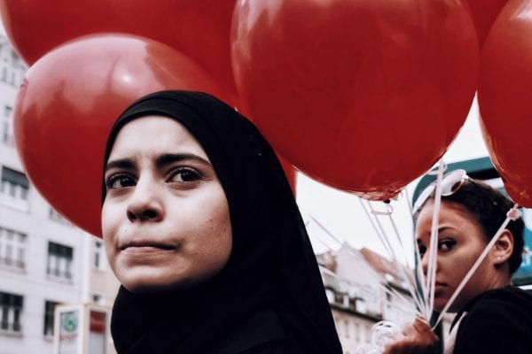 portrait of a woman, street photography of a person, by efi logginou