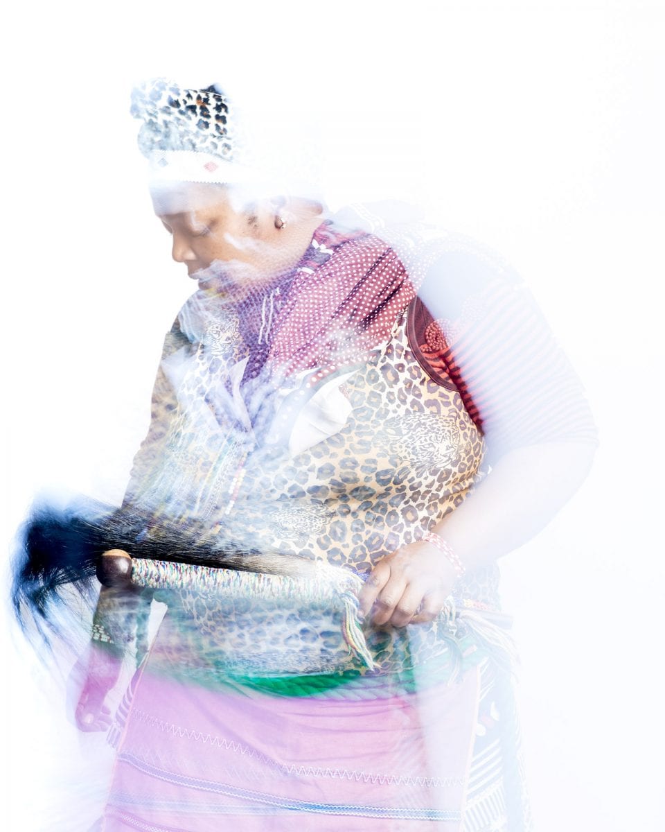 out of focus, blurry, colorful and very contrasted portrait of a healer from South Africa by Thom Pierce