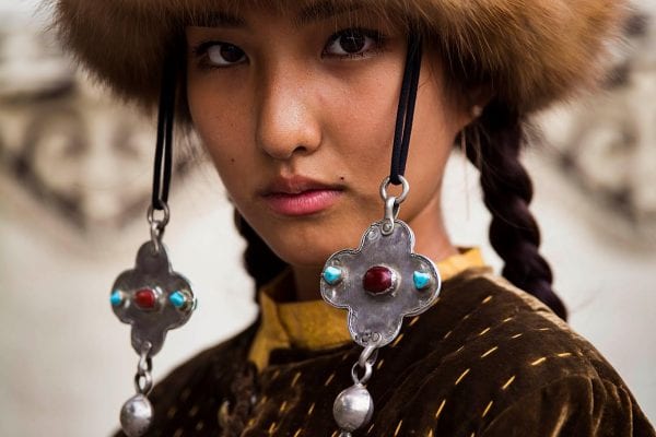 kyrgyzstan woman wearing hat portrait photography in color by mihaela noroc, the atlas of beauty series