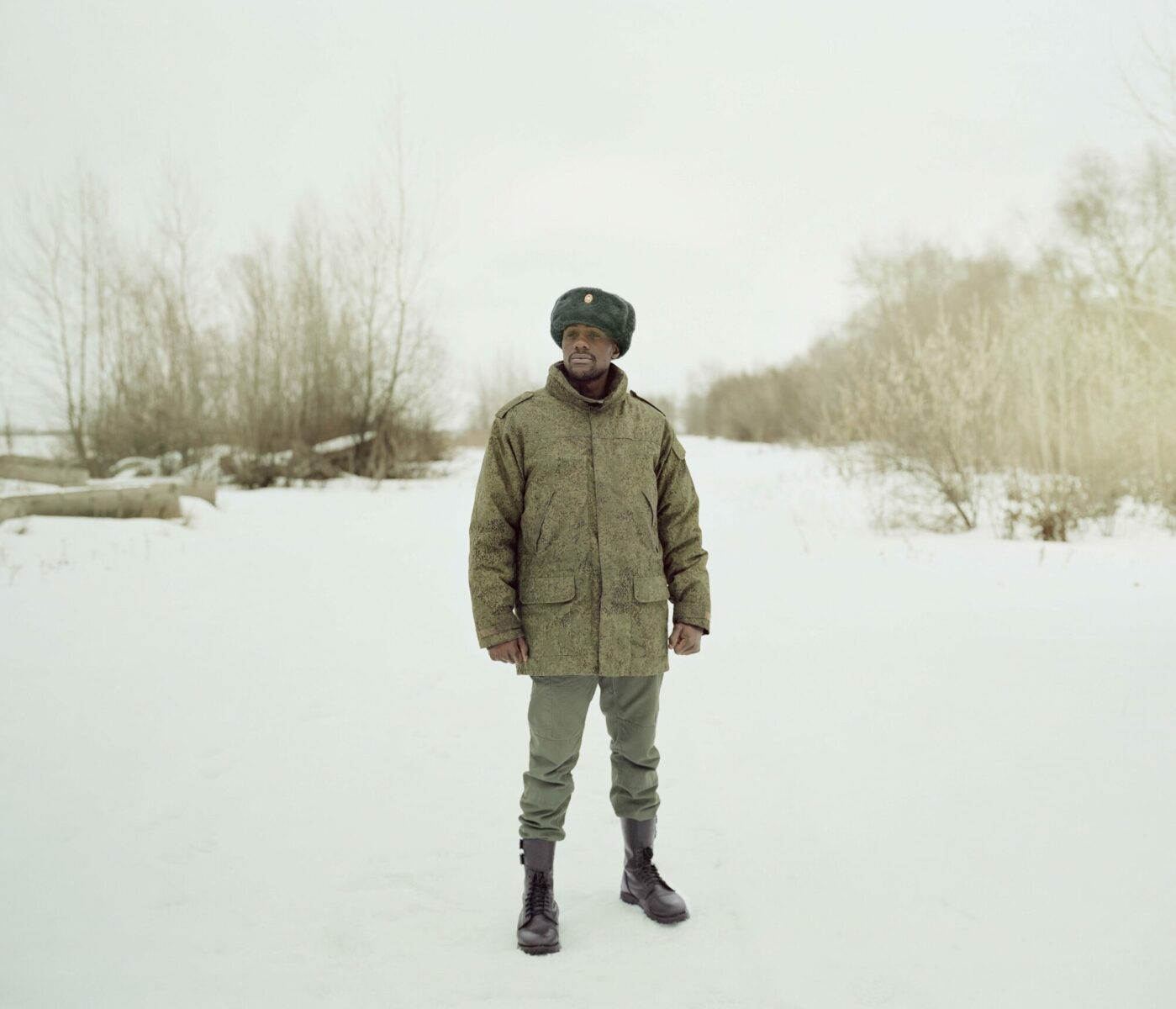 Medium format color portrait of a black man in Russia by Justin Barton