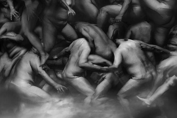 black and white photography of human bodies on a dark background by Korean Photographer Dongwook Lee