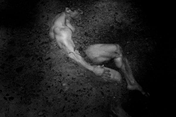 black and white photography of human bodies on a dark background by Korean Photographer Dongwook Lee