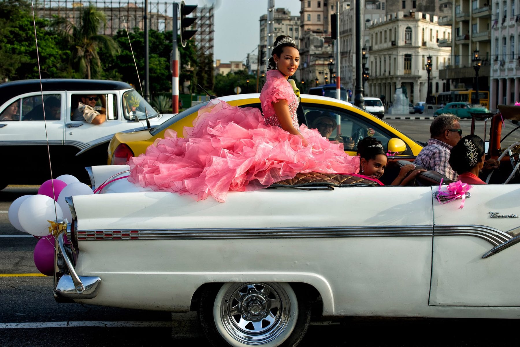 Color photo of a girl celebrating her "Quinceañera" in Havana, Cuba