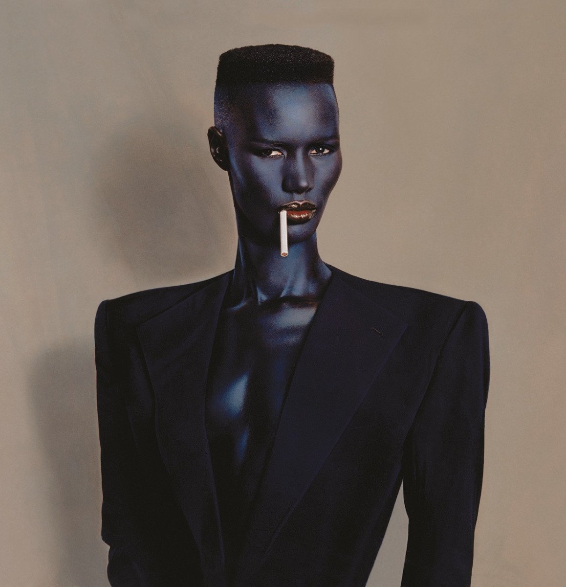 Photography And Music - Grace Jones, blue-black in black on brown, New York, 1981. © Jean-Paul Goude