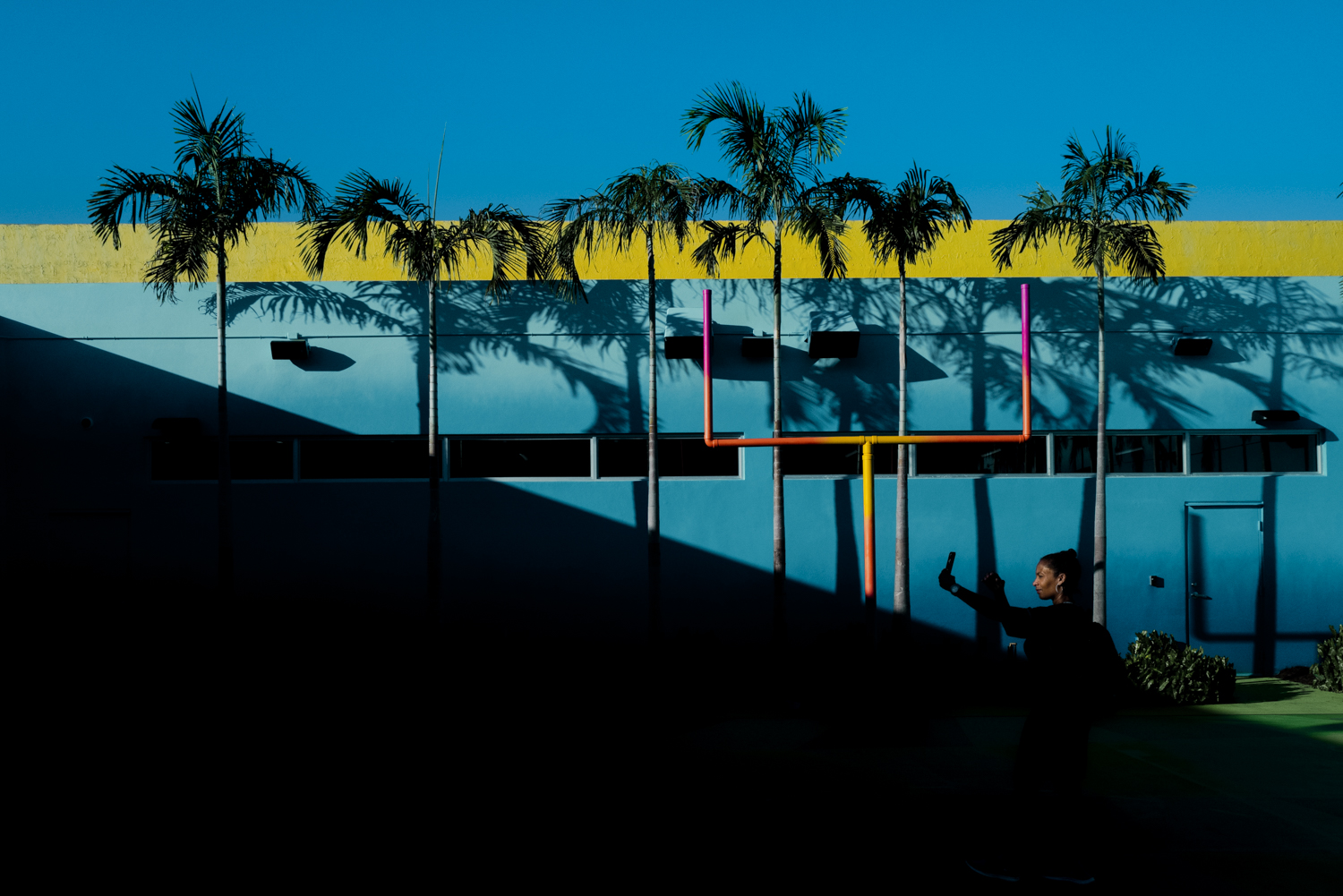 photograph of a woman taking a selfie in Miami, Florida