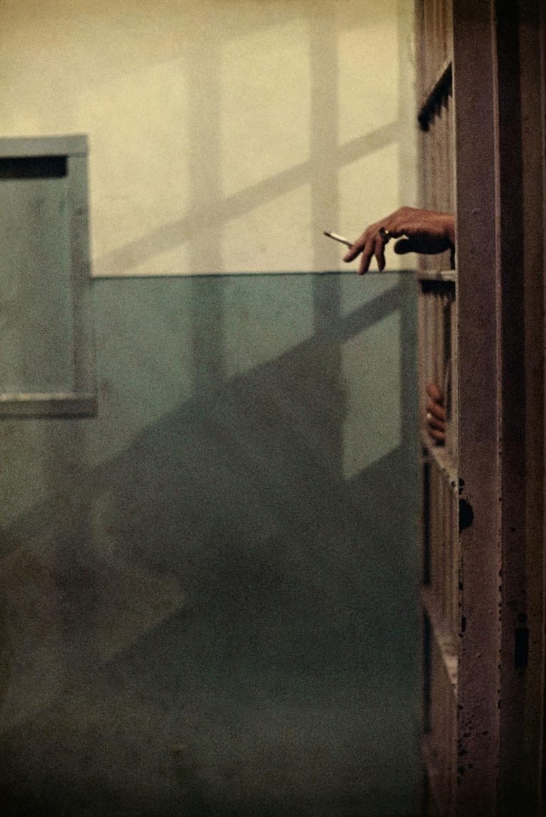 A picture of a man's hand and cigarette in Illinois jail © Courtesy The Gordon Parks Foundation