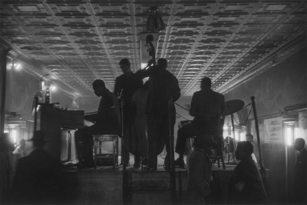 Black & white photo of jazz musicians by Roy De Carava