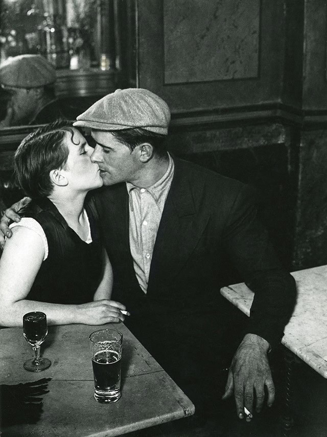 Black & White photography by Brassaï. Couple in a bar in Paris.