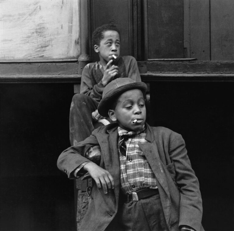 Black and White street photography by Helen Levitt, elderly women NYC, young boys smoking