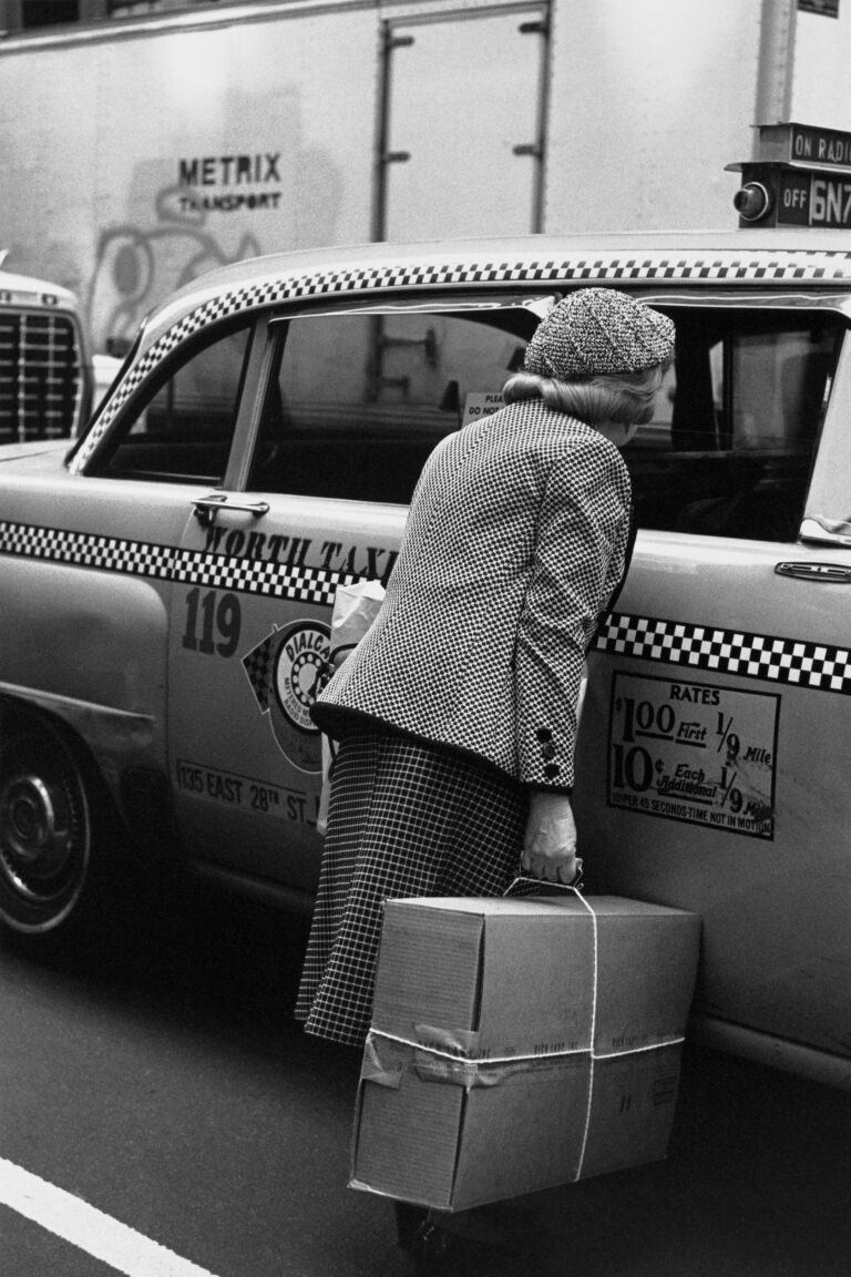 Black and White street photography by Helen Levitt, woman, taxi, NYC