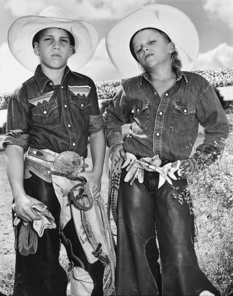 Black and white photography by Mary Ellen mark, two children in cowboy outfits at rodeo, texas 1991