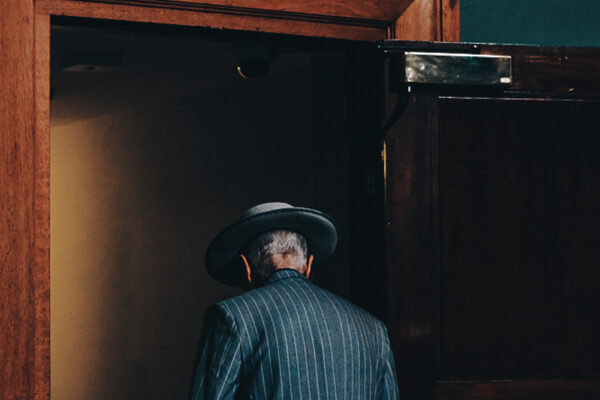 color street photo of a man in pub by Francesco Gioia