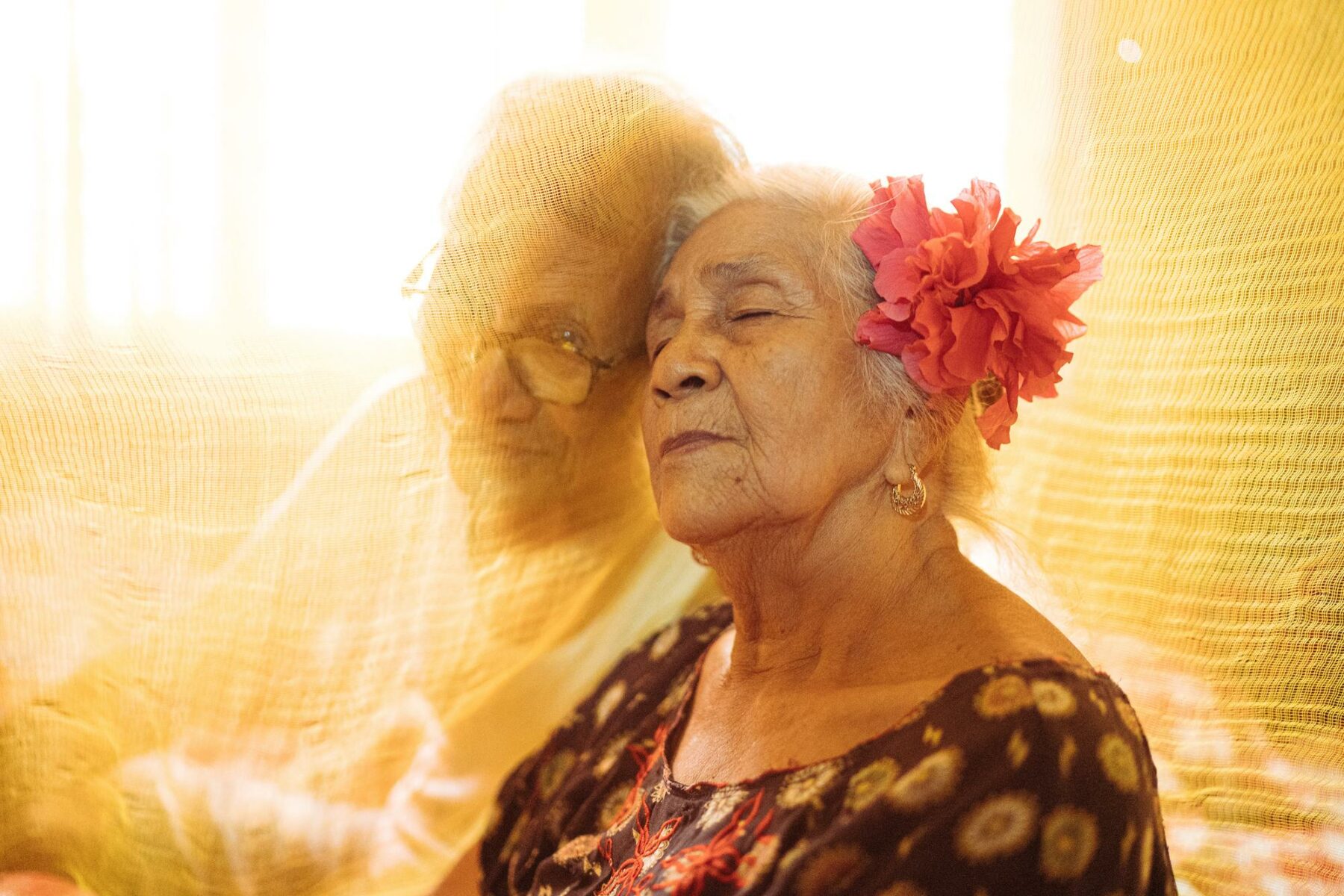 From the series 'Roots From Ashes' From the series, portrait of elderly couple. Documentary photography by Hannah Reyes Morales