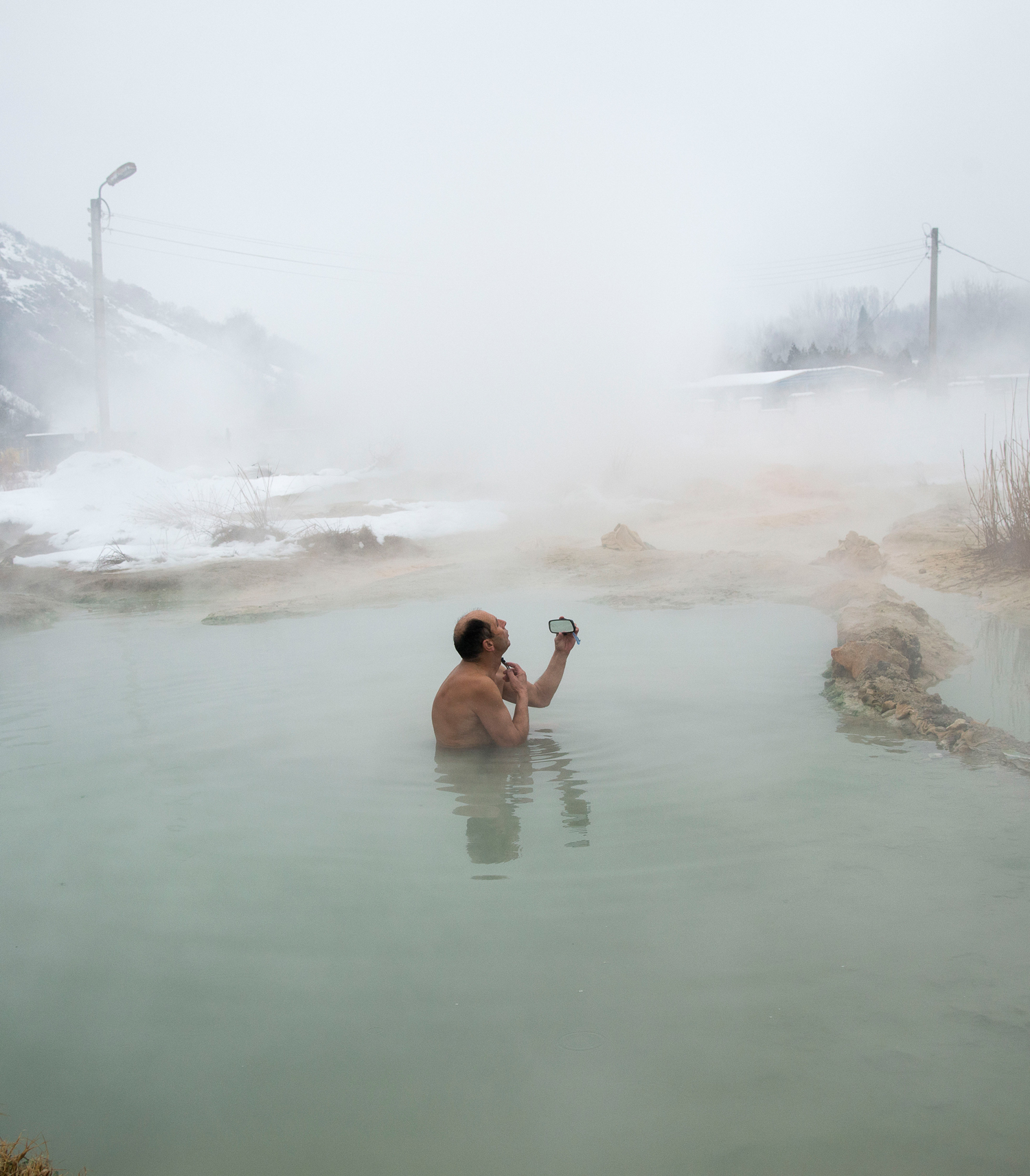 Coor photography of a man taking a bath by Ivelina Berova