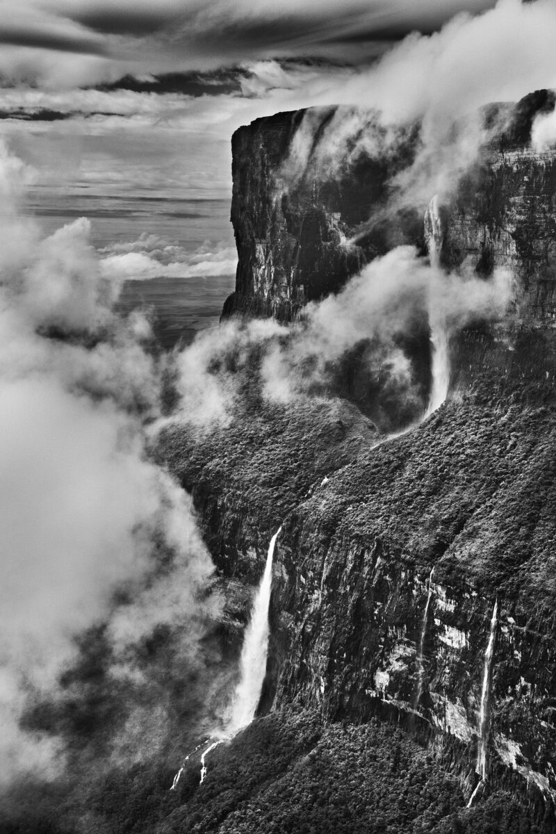 Black & White photography by Sebastião Salgado, Mount Roraima, Roraima state, Brazil. Waterfall, mountain, amazon rainforest Brazil. From the exhibition Amazonia