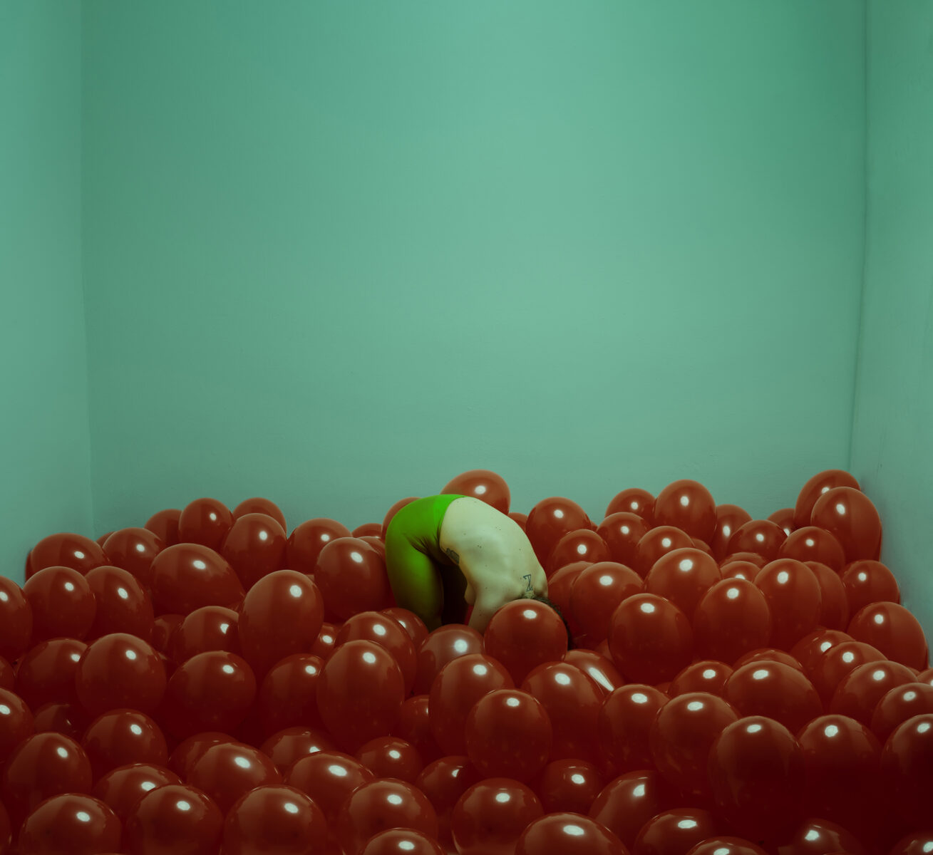 color photo of a woman with red ballons by Paolo Barretta