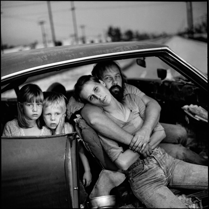 Black and white documentary photography by Mary Ellen Mark. Family in their car