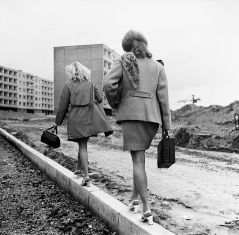 Black & white photography by Antanas Sutkus. Two women walking on pavement, Vilnius, 1976