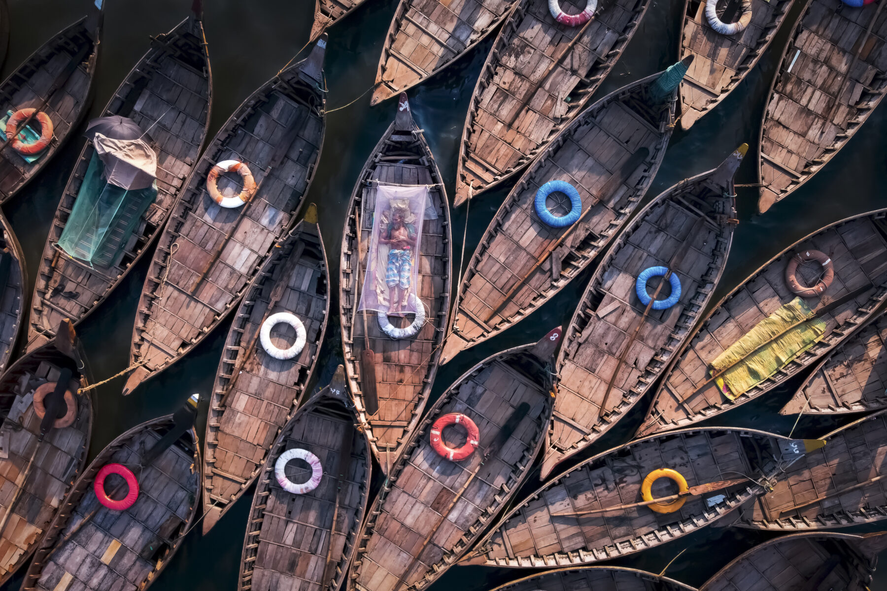 Visual Story Award - aerial color photo of floating boats in Bangladesh by Sujon Adhikary - The 100 Most Inspirational Photography Quotes