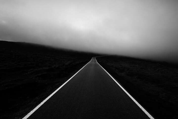 black and white landscape film photo of a road by Alexandre Caetano