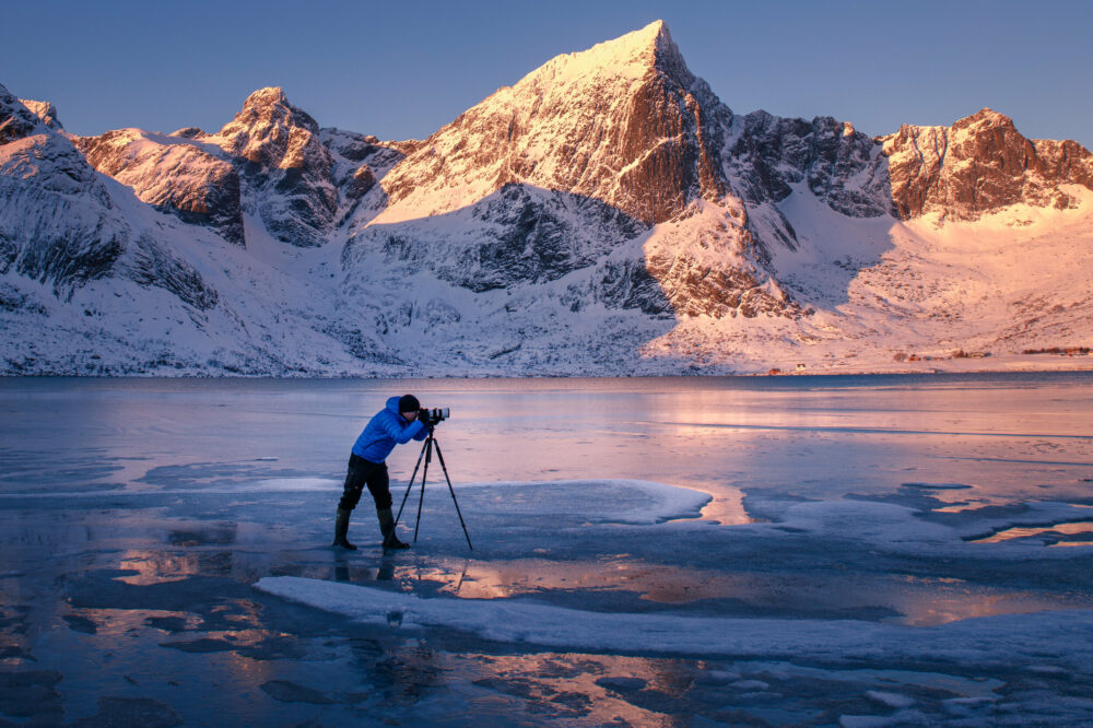 Color photo of Kai Hornung photographing in Iceland