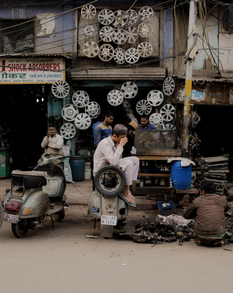 Color photography by Zoë Waldman, boys on mopeds resting