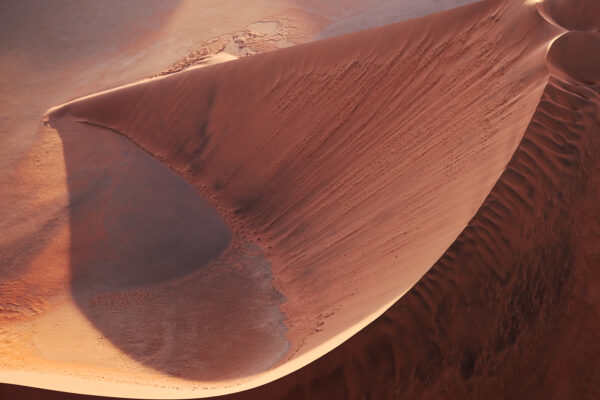 color aerial landscape photograph of sand dunes in Namibia by Brooke Holm