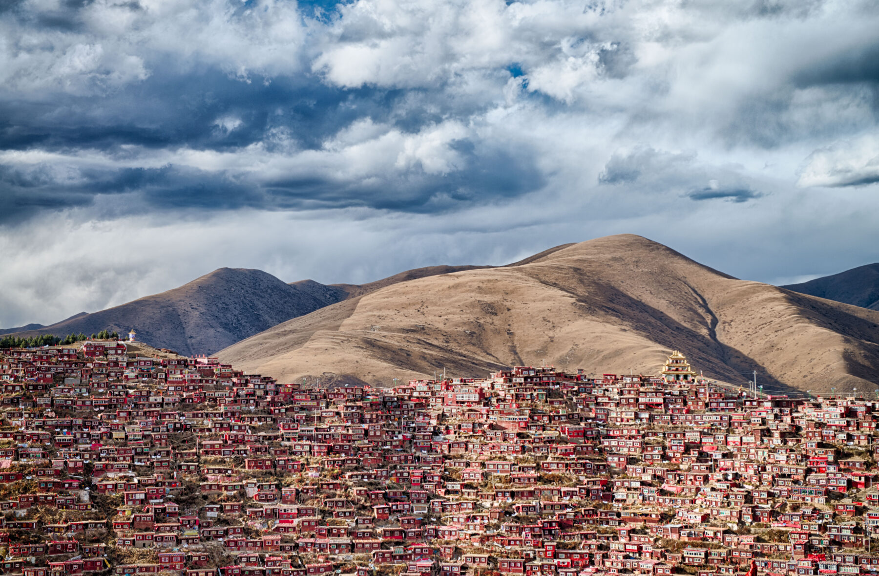 color landscape photograph of the Larung Gar Buddhist Academy in Sichuan, China by Attila Balogh