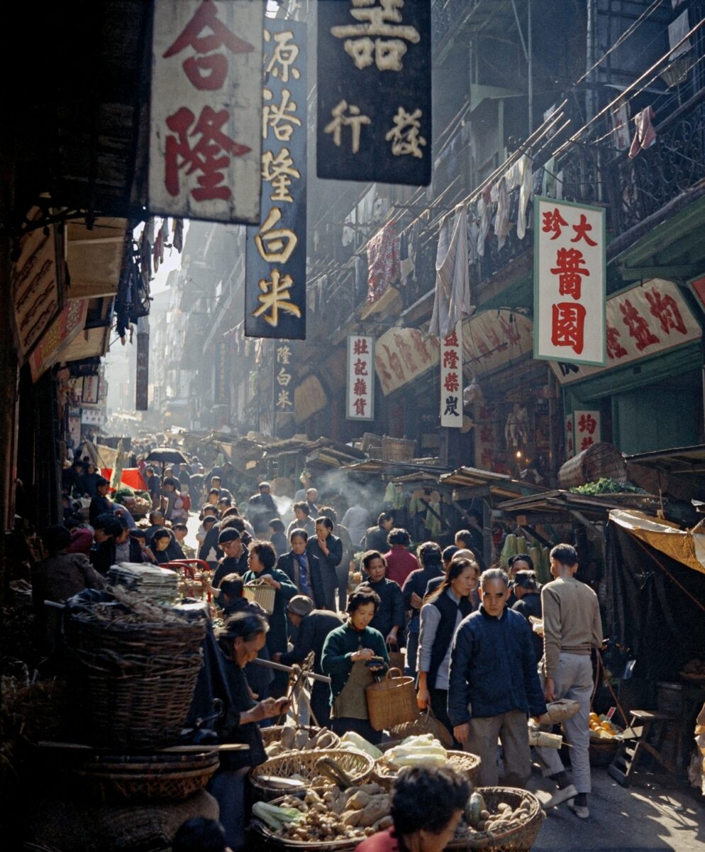 Color street photography by Fan Ho. Hong Kong market, 1950s 60s