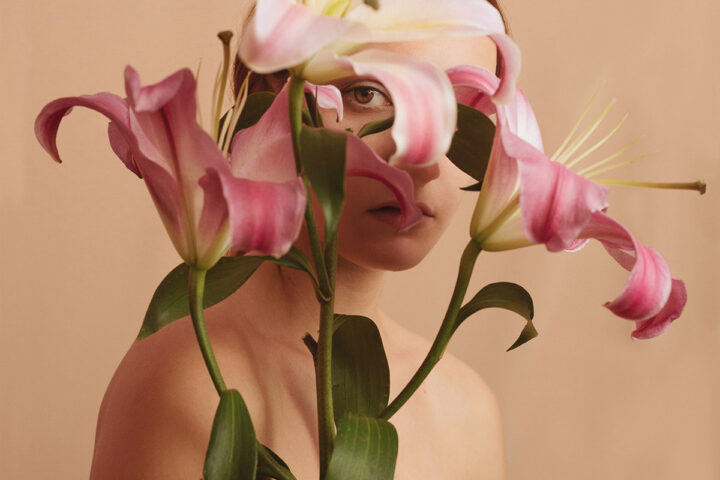 Color photography by Foteini Zaglara. Portrait of woman with flowers. From 10 Stunning Color Images.