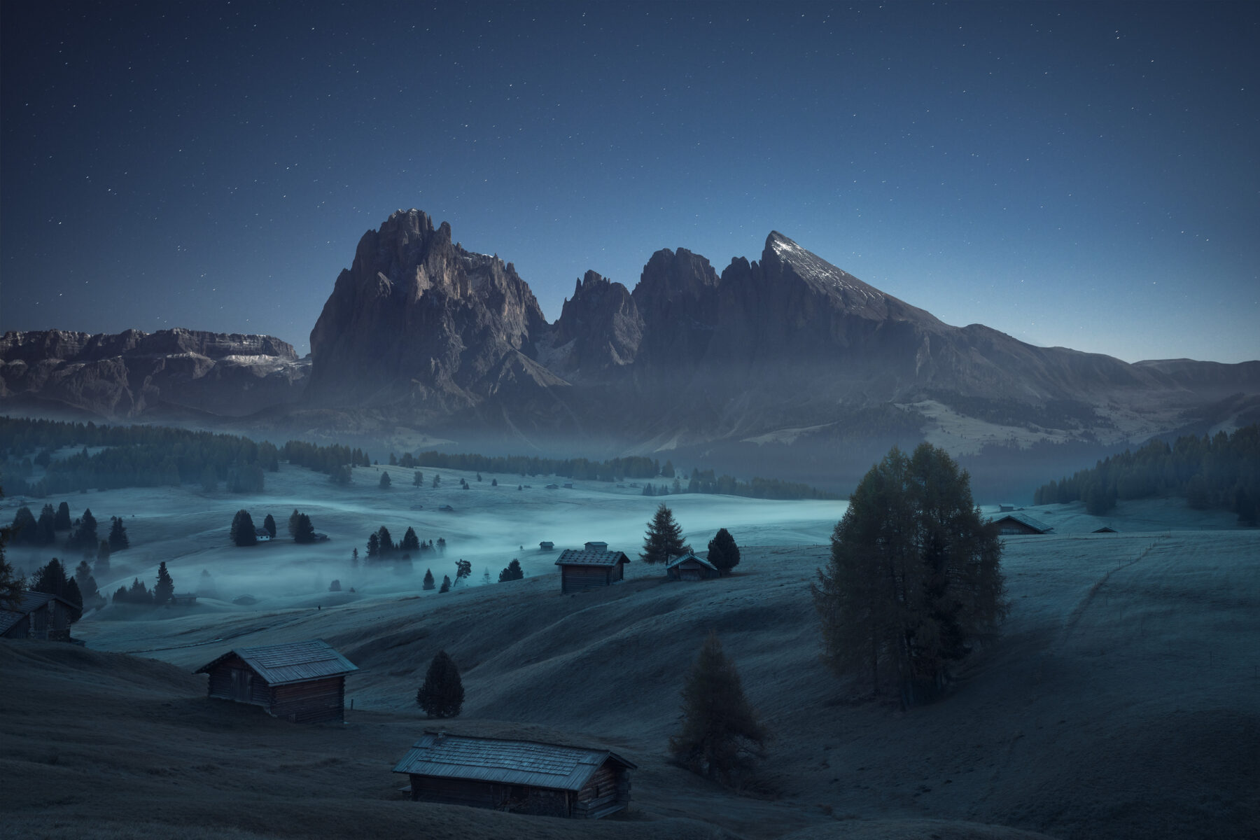 color landscape photo of Italian Dolomites at night by Philipp Oberhuber