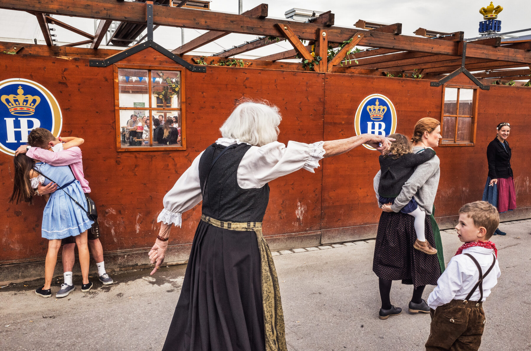 color street photo of oktober fest in Munich, Germany by Davide Albani