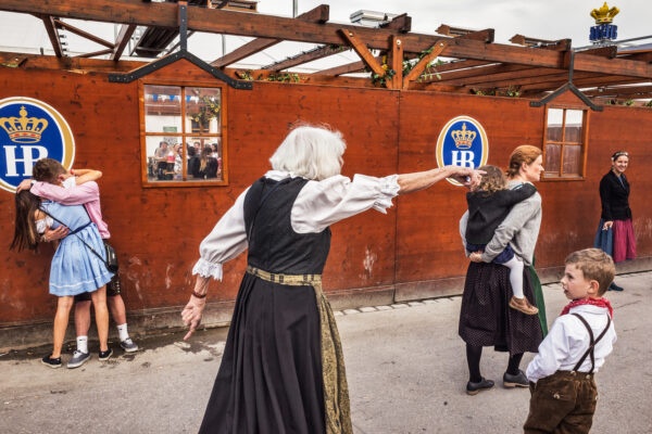 color street photo of oktober fest in Munich, Germany by Davide Albani