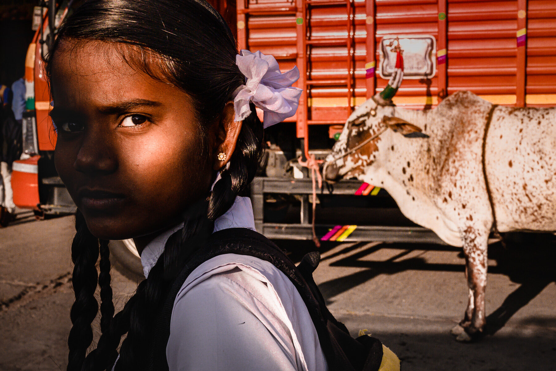 color portrait photo of a school girl in India by Anna Biret