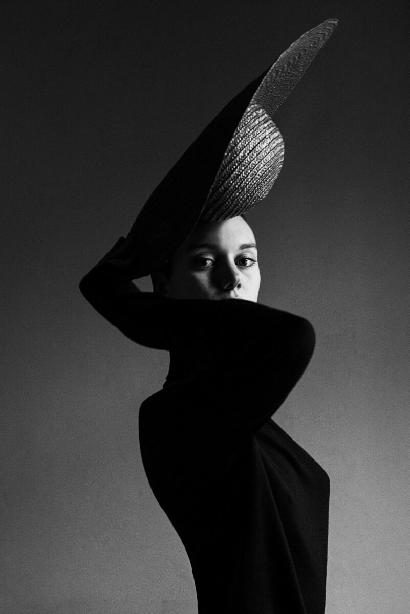 black and white studio portrait of a white woman by Arber Sefa