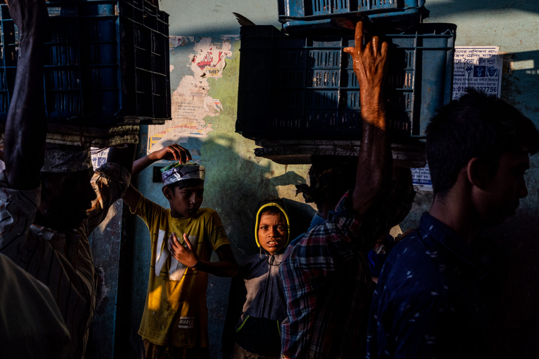 color street photo of two boys in Chittagong, Bangladesh by Inge Colijn