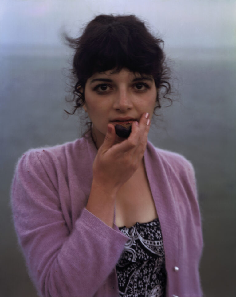 Color film photography portrait by Joel Meyerowitz, Lynette Eating a Plum, 1981