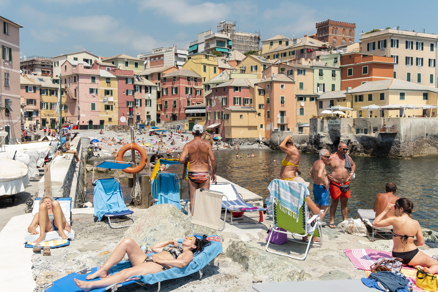 colorful summer street scene on the seafront of Boccadasse, Italy by Pierluigi Mesolella