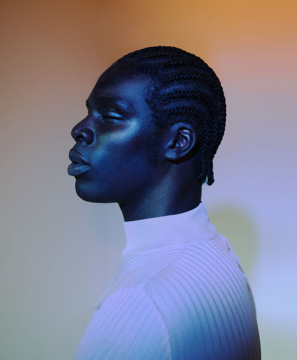 color studio portrait of a black model by Carly Zavala