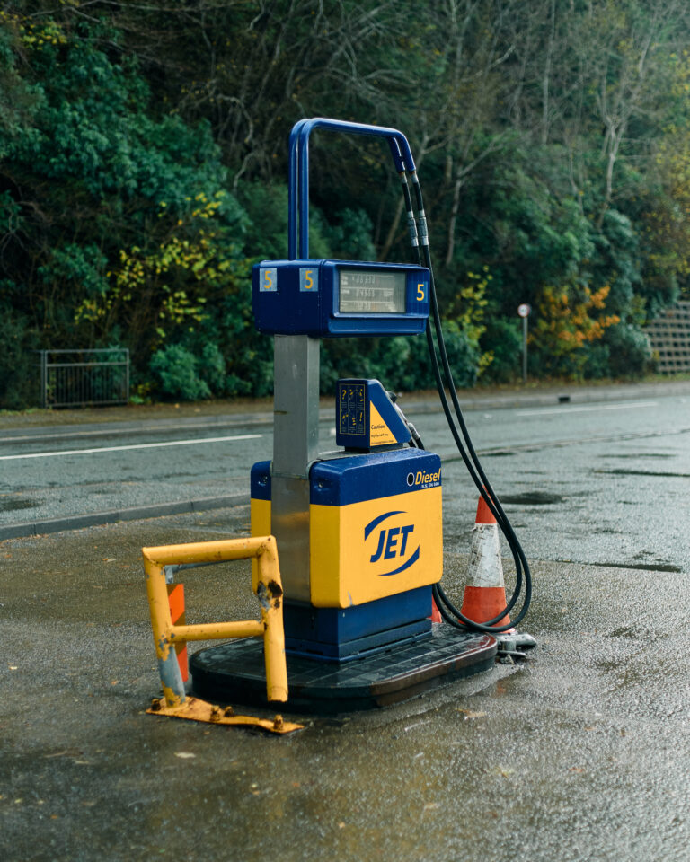 Street photography by Young Chul Kim, gas pump, from the book, Feeling Before Seeing