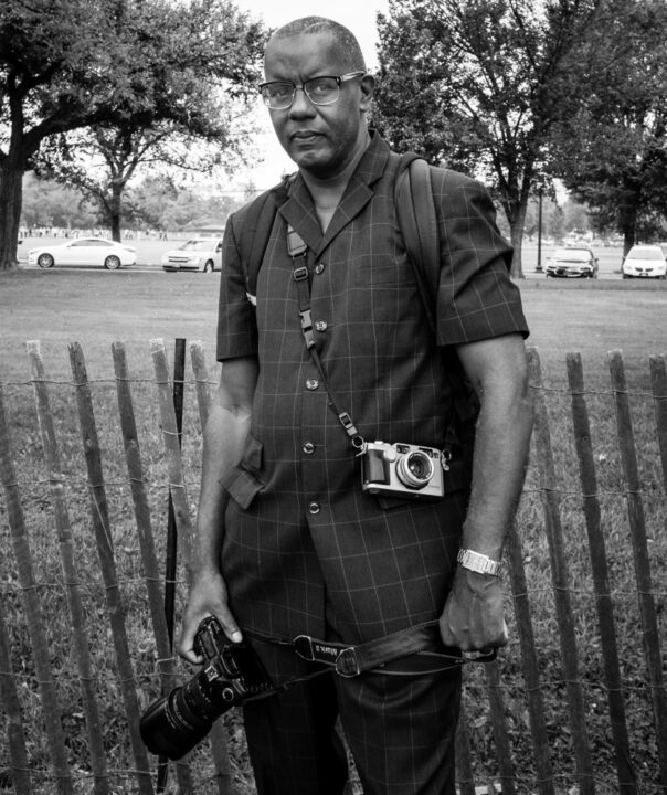 black and white portrait of photographer Jamel Shabazz by Michael McCoy