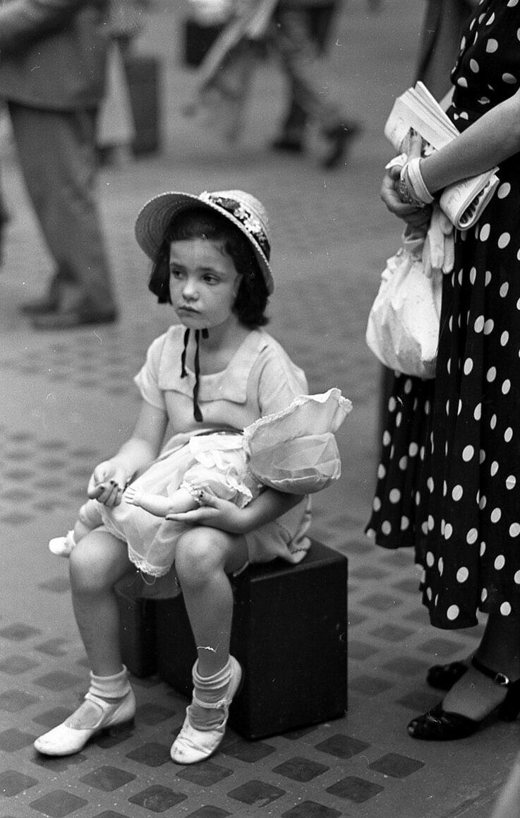 Street photography by Ruth Orkin, girl with doll