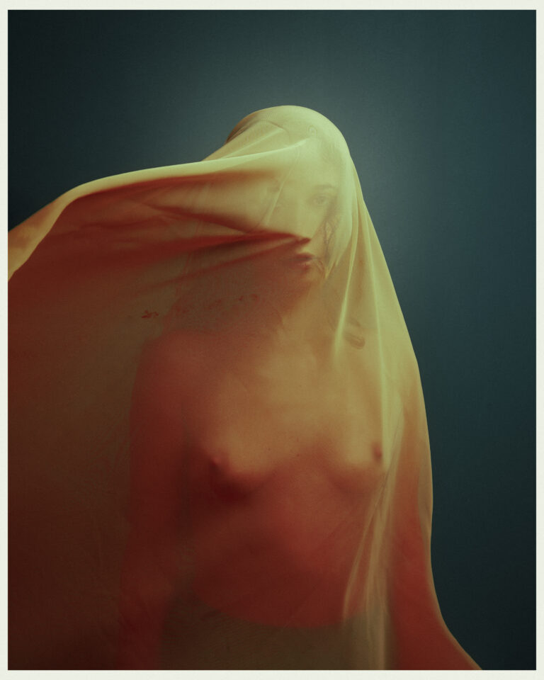 Color photography by Paolo Baretta. Portrait of woman wrapped in sheet