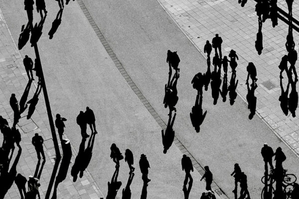 black and white street photo of people walking in new york city, usa by Julien Schoener