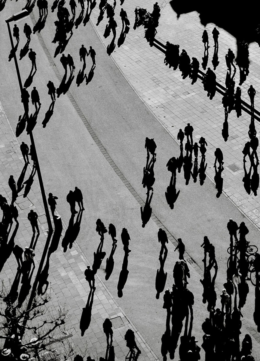 black and white street photo of people walking in new york city, usa by Julien Schoener